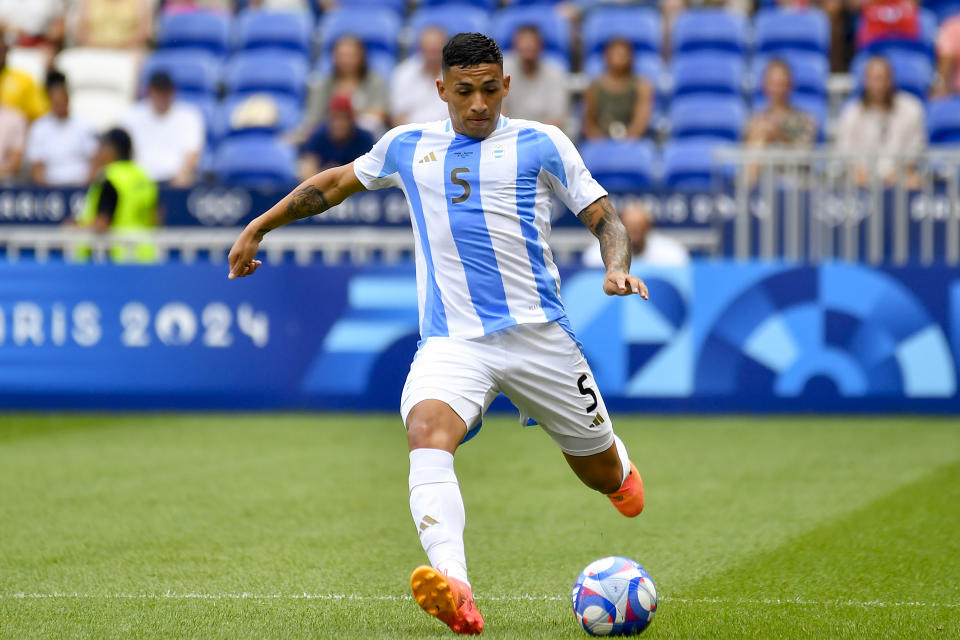 LYON, FRANCE - JULY 30: Ezequiel Fernandez of Argentina looks to bring the ball down during the Men's group B match between Ukraine and Argentina during the Olympic Games Paris 2024 at Stade de Lyon on July 30, 2024 in Lyon, France. (Photo by Eurasia Sport Images/Getty Images)