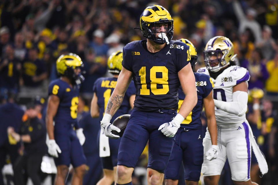 Colston Loveland (18) is one of several members of the defending champion Michigan Wolverines near the top of Nate Tice's 2025 big board. (Photo by CFP/Getty Images)