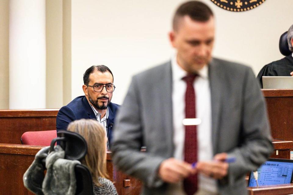 Candido Rodriguez, a brother of Marvin Rodriguez, looks at Assistant Criminal District Attorney Peter Gieseking while on the witness stand during his brother’s murder retrial in 396th District Court at Tim Curry Criminal Justice Center in Fort Worth on Thursday, Aug. 1, 2024. The homicide occurred while Rodriguez and his family were tailgating outside AT&T Stadium in Arlington after a Cowboys game in 2015.