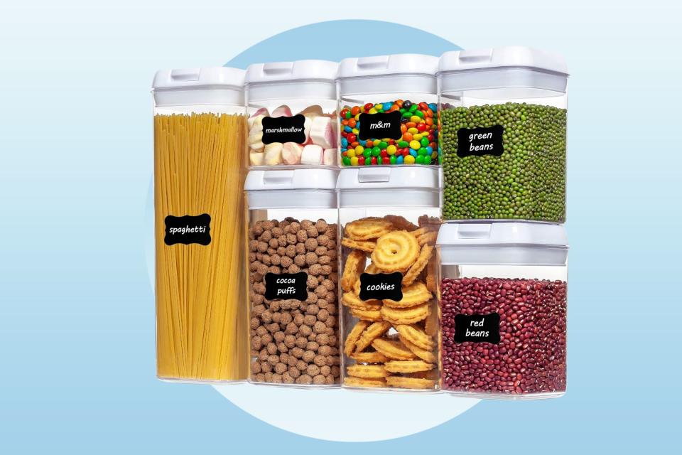 Seven clear storage containers in different sizes.