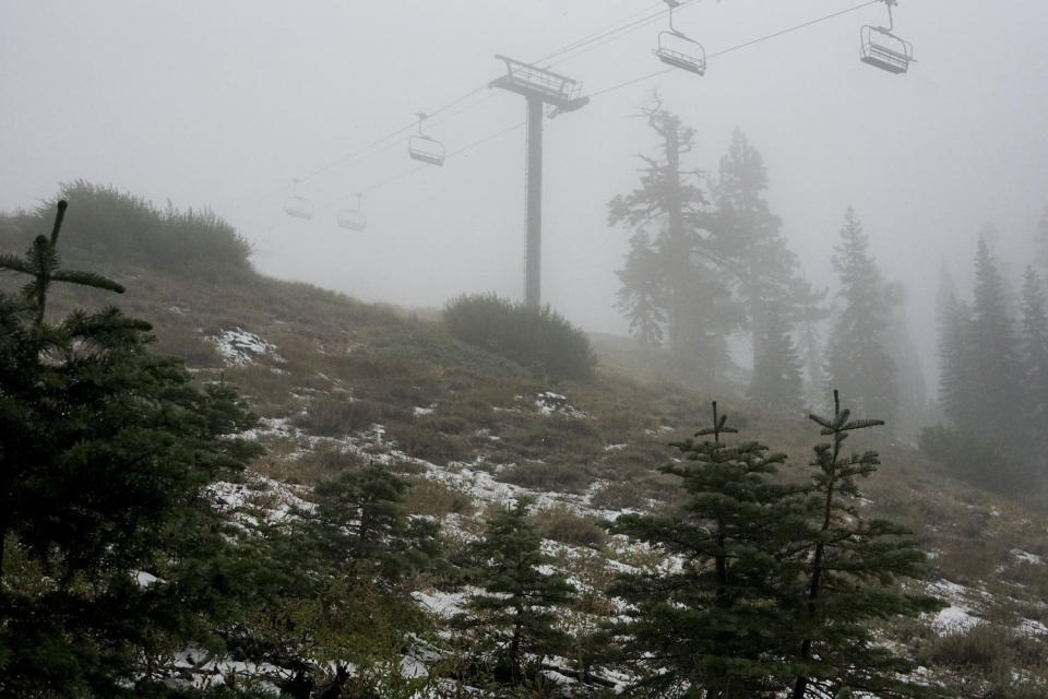 A coating of snow is seen below ski lifts at Sugarbowl Ski Resort in Donner Summit, Calif. (Brooke Hess-Homeier / AP)