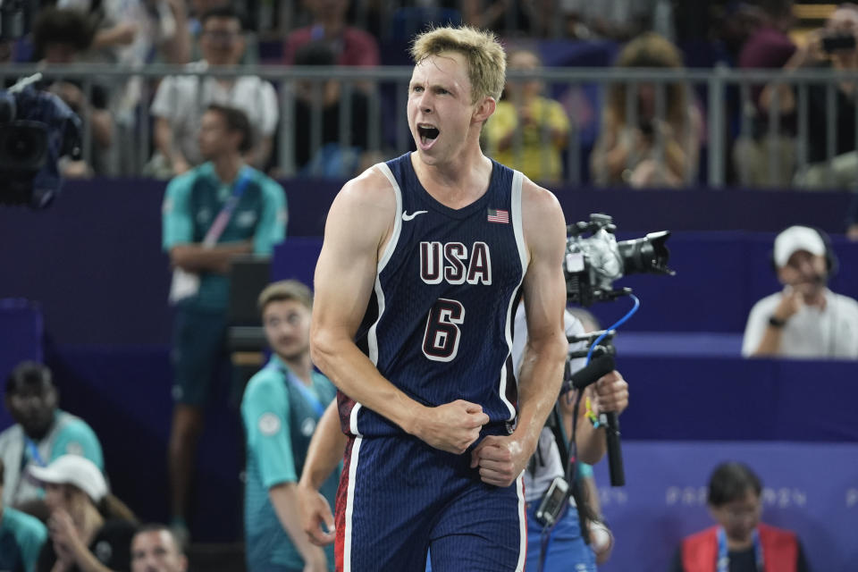 Canyon Barry (6), of the United States, celebrates after a men's 3x3 basketball pool round match against China during the 2024 Summer Olympics, Friday, Aug. 2, 2024, in Paris, France. The United States won 21-17. (AP Photo/Frank Franklin II)