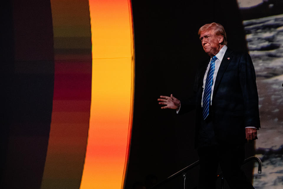 NASHVILLE, TENNESSEE - JULY 27: Former President and 2024 Republican presidential candidate Donald Trump approaches the stage for a keynote speech on the third day of the Bitcoin 2024 conference at Music City Center July 27, 2024 in Nashville, Tennessee. The conference, which is aimed at bitcoin enthusiasts, features multiple vendor and entertainment spaces and seminars by celebrities and politicians. (Photo by Jon Cherry/Getty Images)