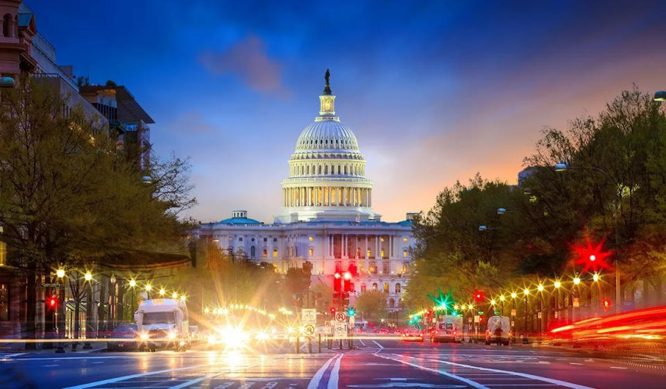 United States Capitol Washington DC street view lights cars night time