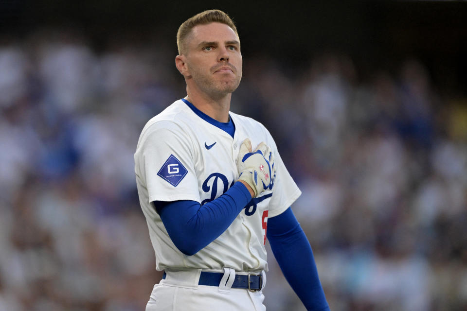 Aug 5, 2024; Los Angeles, California, USA;  Los Angeles Dodgers first baseman Freddie Freeman (5) acknowledges the crowd as he got a standing ovation as he approached the plate for his first at bat against the Philadelphia Phillies at Dodger Stadium. Mandatory Credit: Jayne Kamin-Oncea-USA TODAY Sports