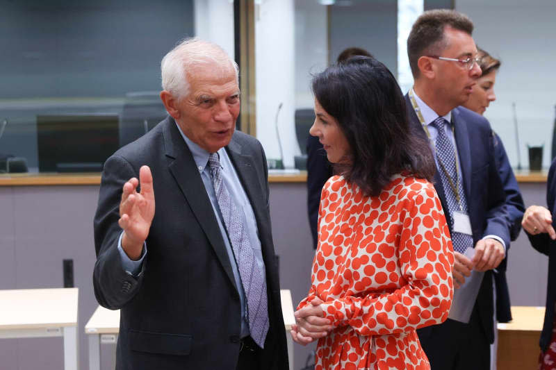 EU High Representative for Foreign Affairs and Security Policy Josep Borrell (L) talks with German Foreign Minister Annalena Baerbock during the EU Foreign Ministers' informal meeting in Brussels. Francois Lenoir/EU Council/dpa