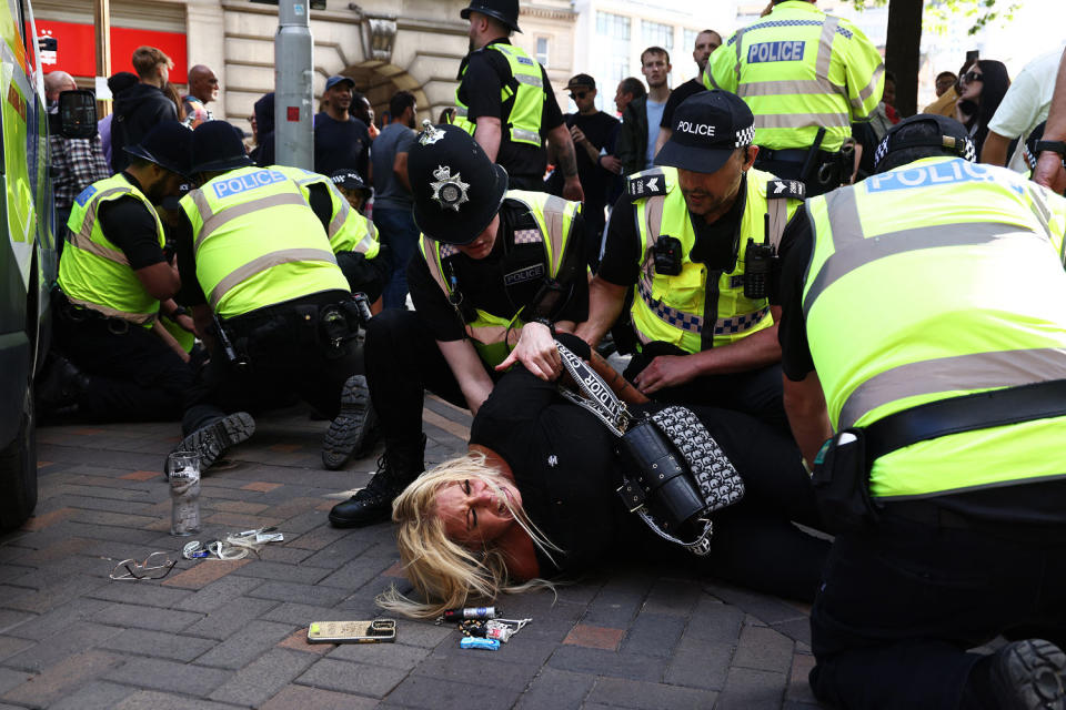 UK police prepared for planned far-right protests and other demonstrations this weekend, after two nights of unrest in several English towns and cities following a mass stabbing that killed three young girls. (Darren Staples / AFP - Getty Images)