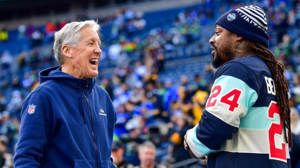 <div>SEATTLE, WASHINGTON - DECEMBER 31: Head coach Pete Carroll of the <a class="link " href="https://sports.yahoo.com/nfl/teams/seattle/" data-i13n="sec:content-canvas;subsec:anchor_text;elm:context_link" data-ylk="slk:Seattle Seahawks;sec:content-canvas;subsec:anchor_text;elm:context_link;itc:0">Seattle Seahawks</a> talks with former Seattle Seahawks running back <a class="link " href="https://sports.yahoo.com/nfl/players/8266/" data-i13n="sec:content-canvas;subsec:anchor_text;elm:context_link" data-ylk="slk:Marshawn Lynch;sec:content-canvas;subsec:anchor_text;elm:context_link;itc:0">Marshawn Lynch</a> prior to a game against the <a class="link " href="https://sports.yahoo.com/nfl/teams/pittsburgh/" data-i13n="sec:content-canvas;subsec:anchor_text;elm:context_link" data-ylk="slk:Pittsburgh Steelers;sec:content-canvas;subsec:anchor_text;elm:context_link;itc:0">Pittsburgh Steelers</a> at Lumen Field on December 31, 2023 in Seattle, Washington.</div> <strong>(Jane Gershovich / Getty Images)</strong>