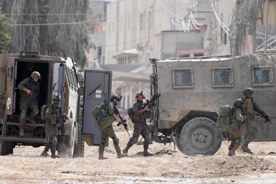 Israeli soldiers operate during a raid in the Nur Shams camp for Palestinian refugees near the city of Tulkarem in the Israeli-occupied West Bank, Aug. 28, 2024. / Credit: JAAFAR ASHTIYEH/AFP/Getty