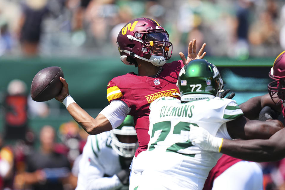 Jayden Daniels' first completion for the Commanders was a sight to see. (Photo by Mitchell Leff/Getty Images)