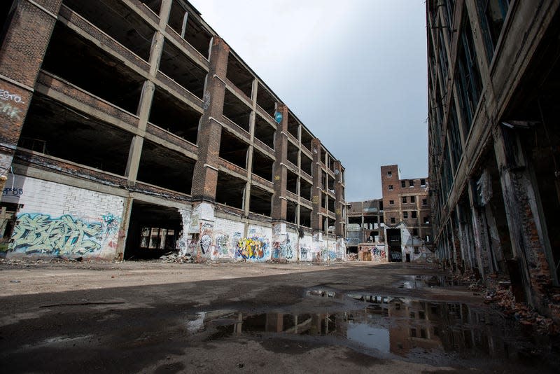 The abandoned Packard auto assembly plant stands in Detroit, Michigan, U.S., on Tuesday, April 21, 2015. Arte Express Detroit LLC Chief Executive Officer Fernando Palazuelo bought the Packard Plant in 2013 and is working to restore the site in hopes of bringing jobs and commerce to the neighborhood. - Photo: Bryan Mitchell/Bloomberg (Getty Images)
