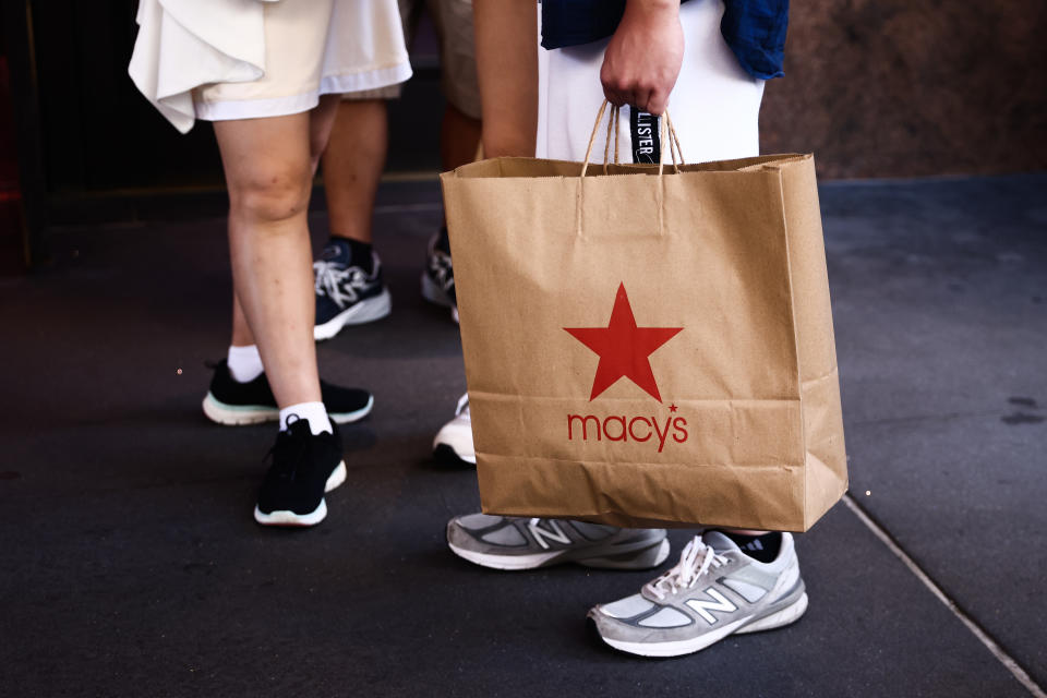 A man is holding Macy's paper bag in Manhattan, New York, United States of America, on July 5th, 2024.
 (Photo by Beata Zawrzel/NurPhoto via Getty Images)