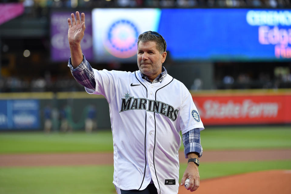 SEATTLE, WASHINGTON - AUGUST 11: Former Seattle Mariners great Edgar Martinez waves to fans after throwing the ceremonial first pitch before the game between the Mariners and the Texas Rangers at T-Mobile Park on August 11, 2021 in Seattle, Washington. (Photo by Alika Jenner/Getty Images)