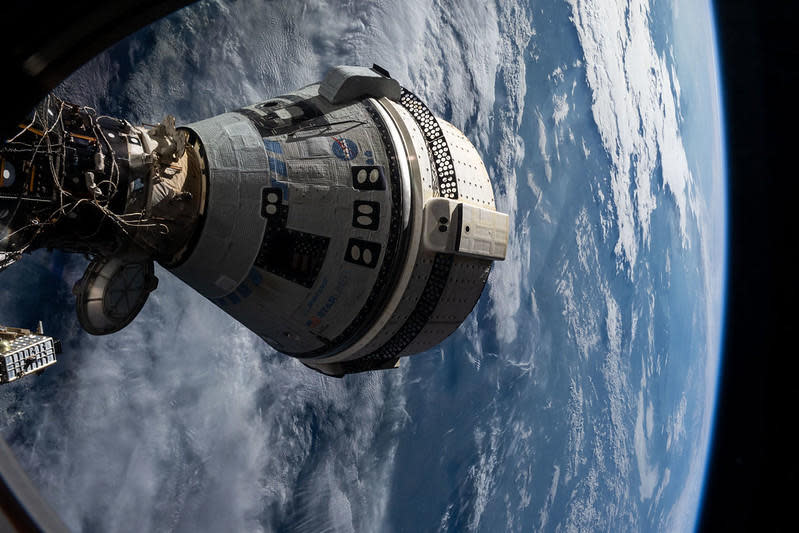 Boeing's Starliner spacecraft, docked to the forward port of the International Space Station.  / Credit: NASA