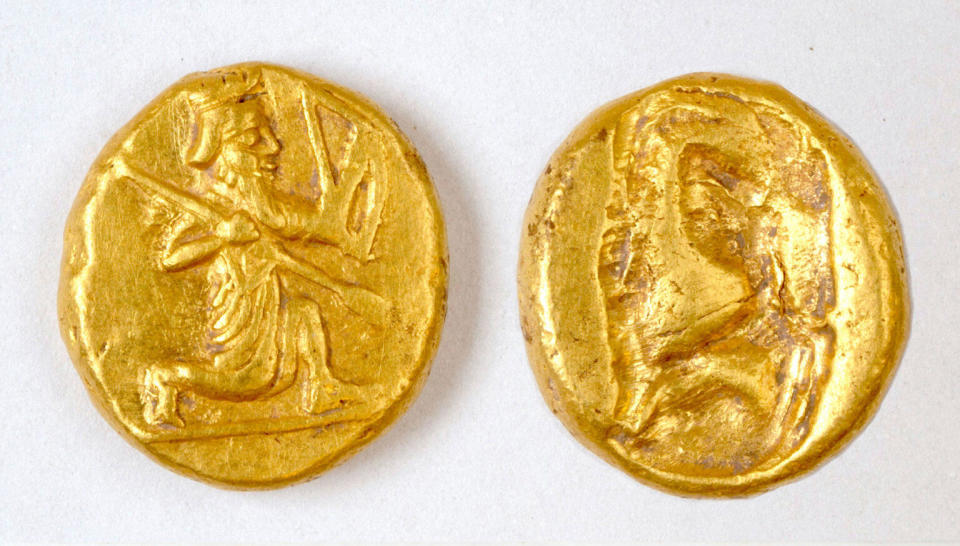 The coins discovered by the researchers feature a figure of a kneeling archer, the characteristic design of the Persian daric. / Credit: Notion Archaeological Project, University of Michigan