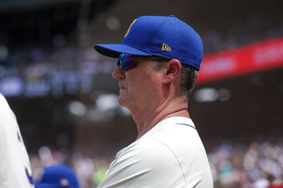 SEATTLE, WASHINGTON - JUNE 30: Manager Scott Servais #9 of the Seattle Mariners in the dugout in the fifth inning during a game against the Minnesota Twins at T-Mobile Park on June 30, 2024 in Seattle, Washington. (Photo by Brandon Sloter/Getty Images)