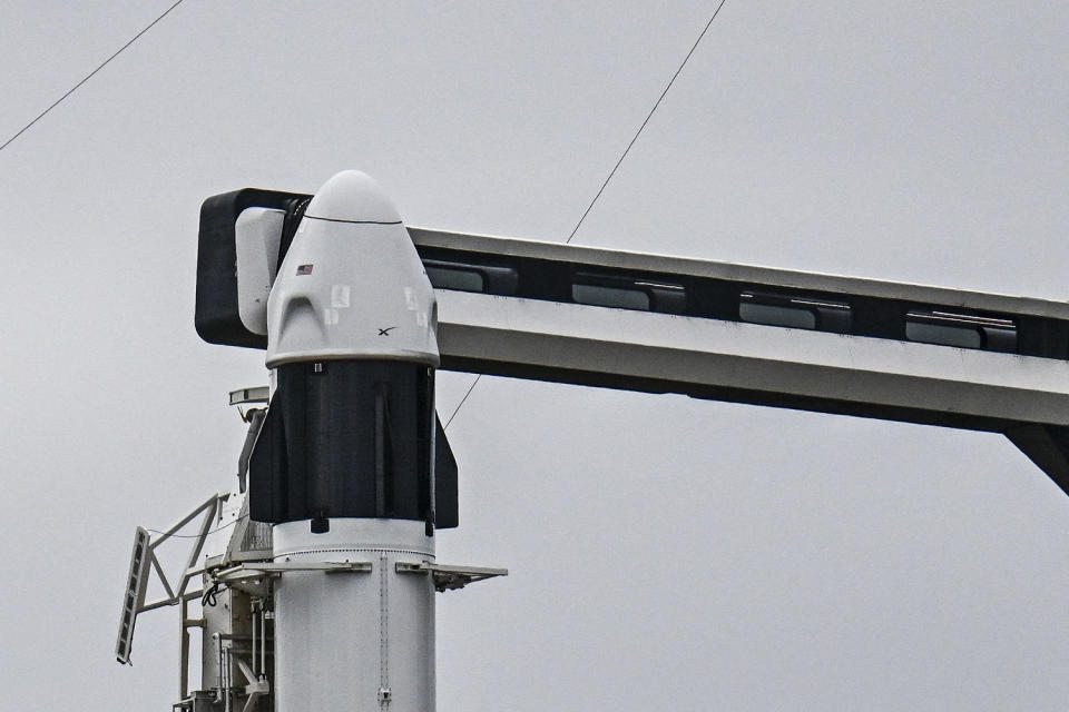 A SpaceX Falcon 9 rocket with Crew Dragon capsule (Chandan Khanna / AFP via Getty Images file )