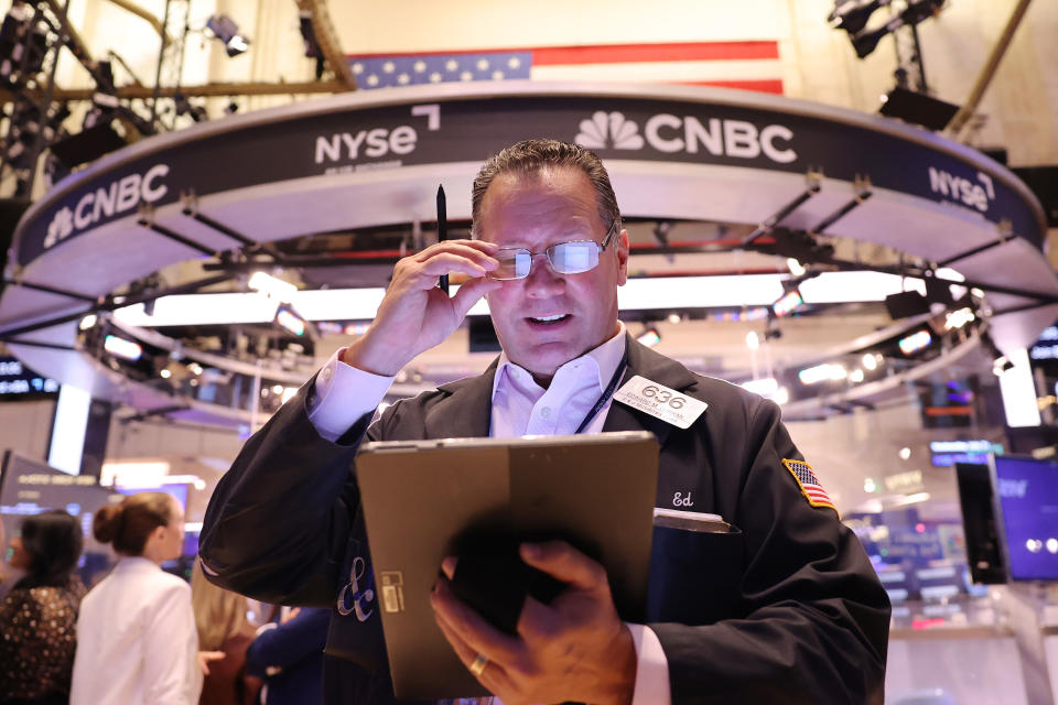 NEW YORK, NEW YORK - JULY 31: Traders work on the floor of the New York Stock Exchange during morning trading on July 31, 2024 in New York City. Stocks opened up high amid the latest earnings reports and the market anticipating an interest rate decision from Federal Reserve Chair Jerome Powell.  (Photo by Michael M. Santiago/Getty Images)