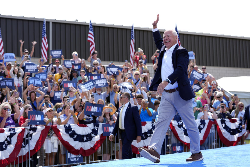 Democratic vice presidential candidate Minnesota Gov. Tim Walz arrives at a campaign rally Wednesday, Aug. 7, 2024, in Eau Claire, Wis. (AP Photo/Julia Nikhinson)