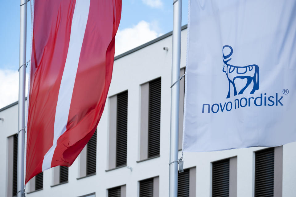 Novo Nordisk advertising flags and logo on facade, Danish pharmaceutical healthcare giant Novo Nordisk AS, production innovative drugs, obesity treatment Ozempic, Mainz, Germany  June 15, 2024