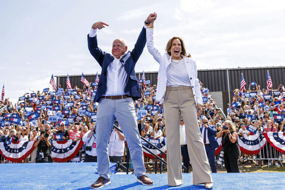 Image: Vice President Kamala Harris is welcomed by running mate Minnesota Gov. Tim Walz (Kerem Yücel / AP)