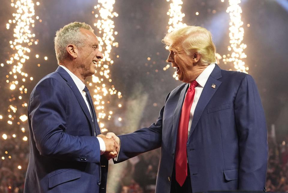 Former President Donald Trump introduces independent Robert F. Kennedy Jr. at a campaign rally in Glendale, Ariz., on Aug. 23, 2024, after Kennedy quit his presidential race and endorsed Trump.