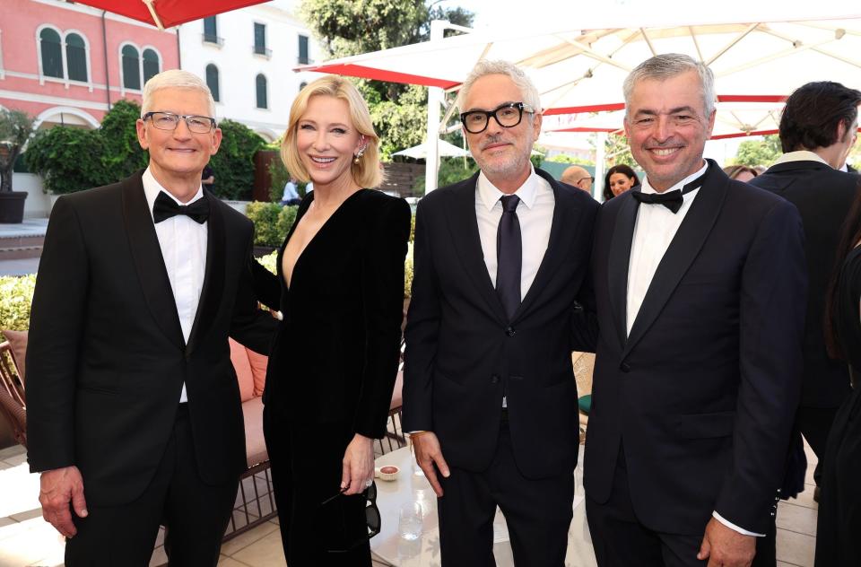 Tim Cook pictured with Blanchett, Cuarón, and Eddy Cue.