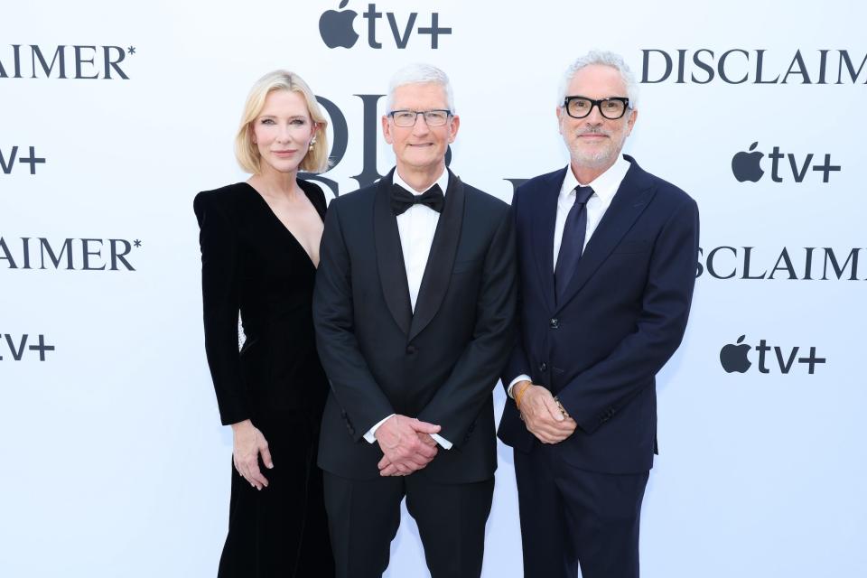 Tim Cook flanked by Cate Blanchett and Alfonso Cuarón at the Venice Film Festival.