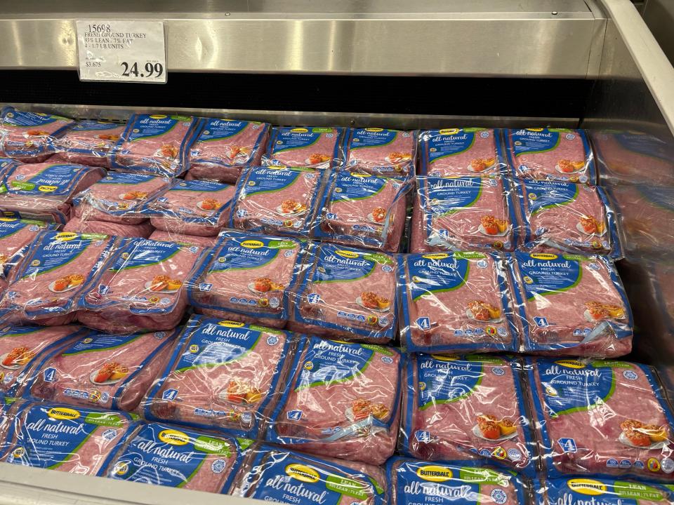 Packs of Kirkland Signature ground turkey in the refrigerated section at Costco.