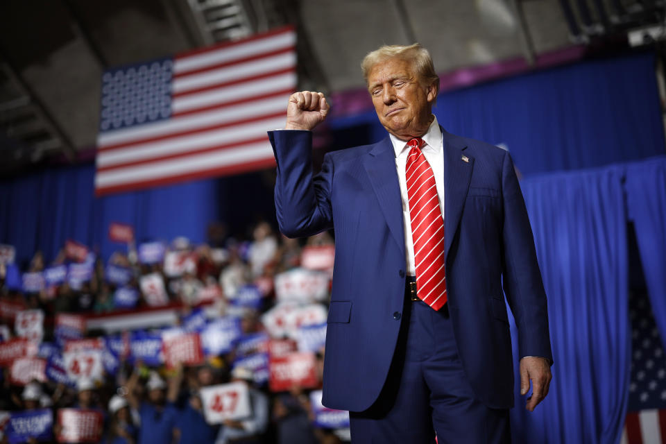 JOHNSTOWN, PENNSYLVANIA - AUGUST 30: Republican presidential nominee, former U.S. President Donald Trump takes the stage during a campaign rally in the 1st Summit Arena at the Cambria County War Memorial on August 30, 2024 in Johnstown, Pennsylvania. Promising to cut energy bills in half, conducting the largest deportation operation in history and putting a 200% tariff on foreign made automobiles, Trump called his election opponents 