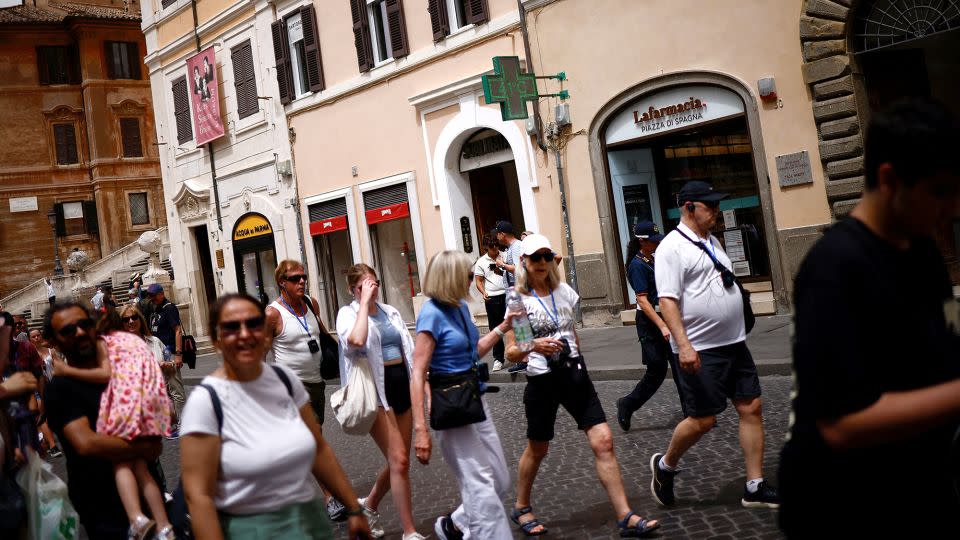 A pharmacy sign displays a temperature of 41 degrees Celsius (105.8 Fahrenheit) at the Spanish Steps amid a heatwave, in Rome, Italy, June 20, 2024. - Guglielmo Mangiapane/Reuters