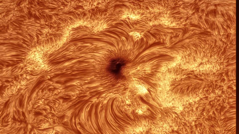 fiery swirls of plasma on the sun's surface