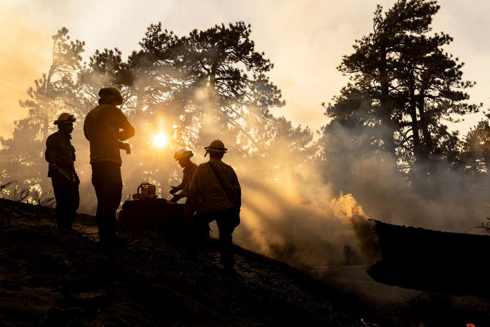 Image: bridge fire california firefighters smoke (Etienne Laurent / AFP - Getty Images)