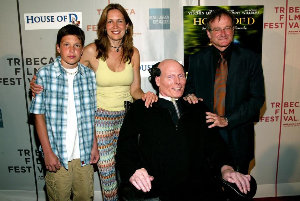 PHOTO: In this May 7, 2004, file photo, actor Robin Williams poses with actor Christopher Reeve, wife Dana Reeve and son Will at the screening of 'House Of D' during the 2004 Tribeca Film Festival in New York. (Evan Agostini/Getty Images, FILE)