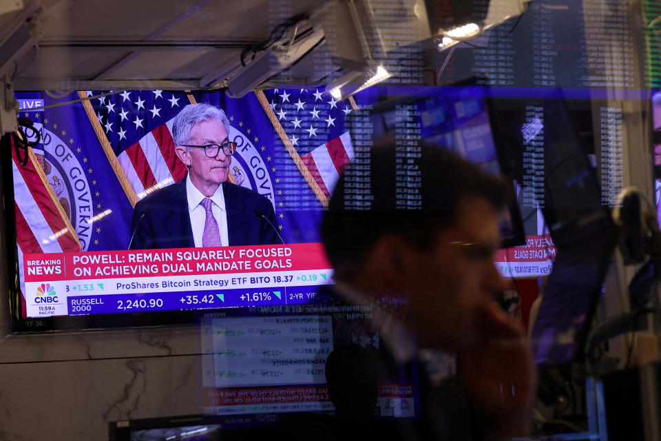 A screen on the trading floor at The New York Stock Exchange (NYSE) display a news conference with Federal Reserve Chair Jerome Powell following the Federal Reserve rate announcement, in New York City, U.S., September 18, 2024. REUTERS/Andrew Kelly