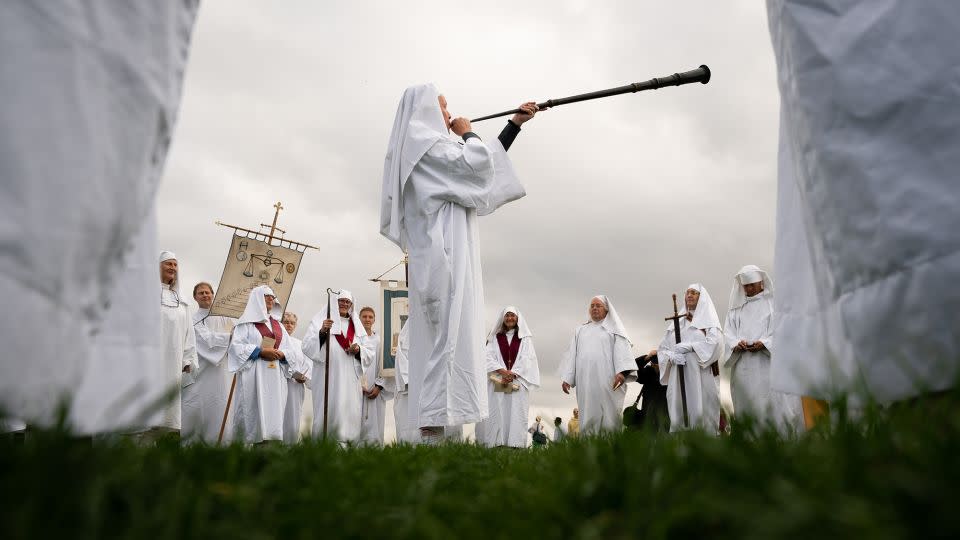 Members of the Druid Order perform a ceremony to celebrate the autumn equinox on Primrose Hill in London on September 23, 2022. - Aaron Chown/PA Images/Getty Images