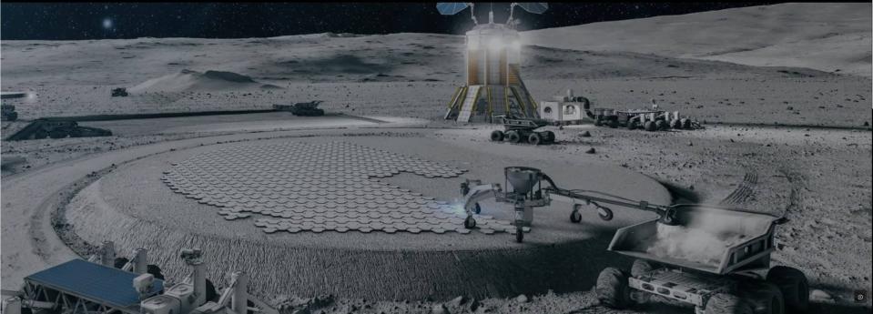 a base full of buildings and solar panels on the grey, dusty surface of the moon