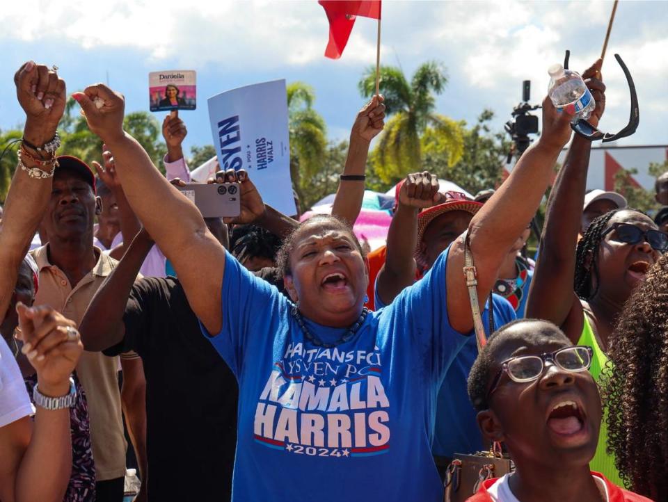 Pembroke Pines resident Audi Sicard of the Broward DNC board, center, joins in support of the South Florida Haitian community as Miami-Dade Democratic Haitian Caucus hosted a rally against the rhetoric of former President Donald Trump and running mate J.D. Vance, the importance of registration to vote, and participation in the election this November 5th on Sunday, September 22, 2024, in North Miami, Florida.