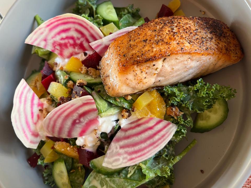 A Salmon Filet Heirloom Beet Salad pops with color at Disneyland Hotel's Palm Breeze Bar.