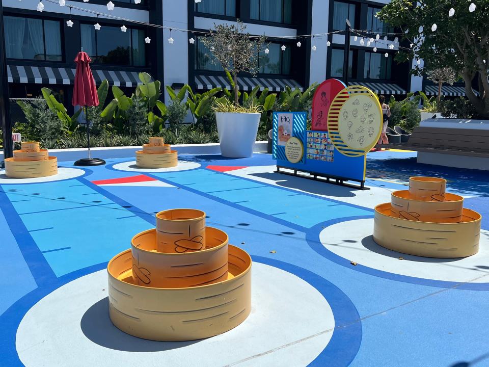 Guests can play "Bao"-themed games on the rooftop of Pixar Place Hotel.