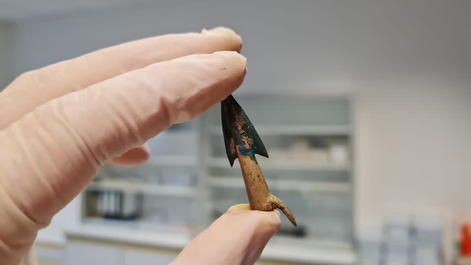 Lead study author Leif Inselmann holds one of the arrowheads recovered from Mecklenburg-Western Pomerania, a state in northeast Germany that’s home to the Tollense Valley. - Leif Inselmann