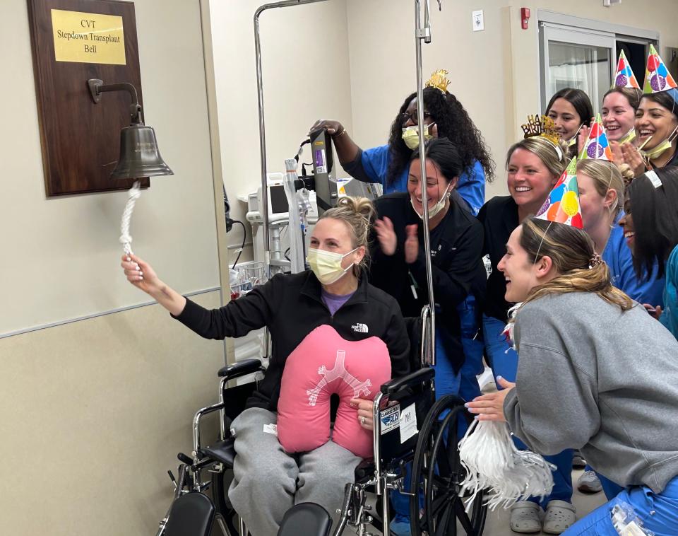 Mandy Wilk ringing the stepdown transplant bell at Northwestern Medicine on June 10, 2024.