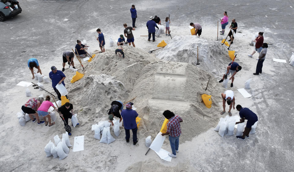 People fill sandbags in Pinellas Park, Fla., on Wednesday ahead of Helene. (Joe Raedle/Getty Images)