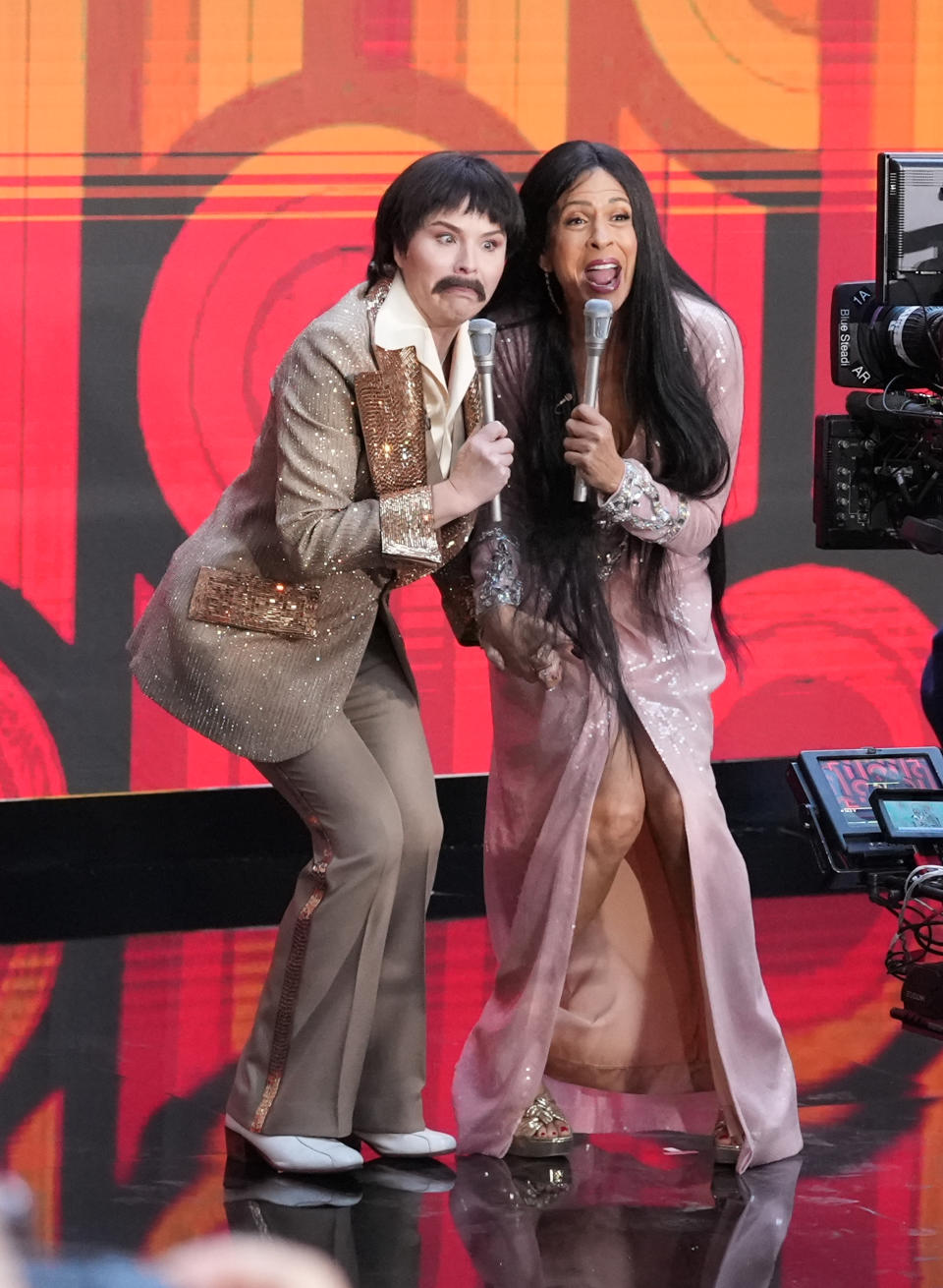 Jenna Bush Hager and Hoda Kotb onstage dressed as Sonny and Cher.