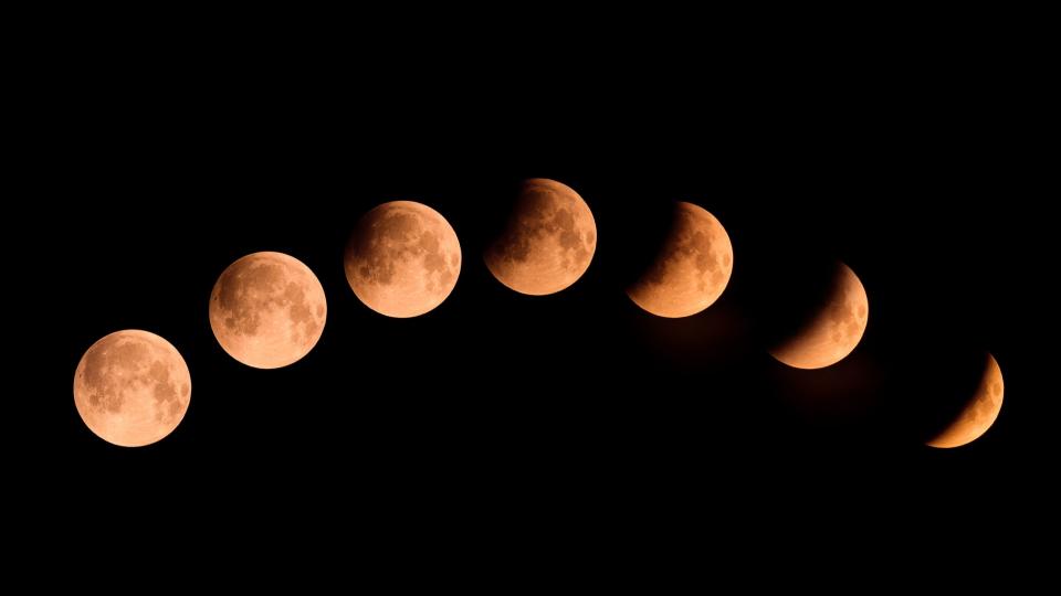  A series of images of the moon becoming increasingly eclipsed by Earth's shadow. 