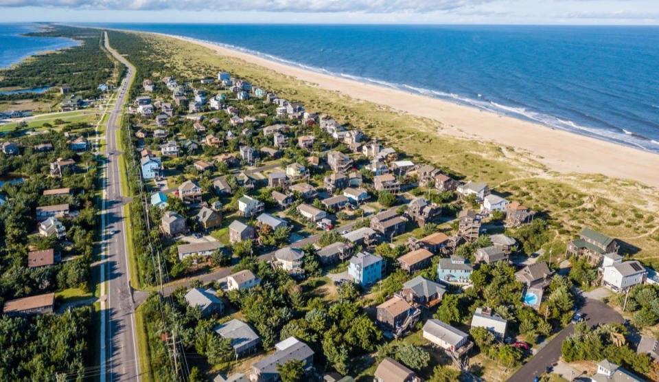 birds-eye view of high income single-family home beach coastal neighborhood