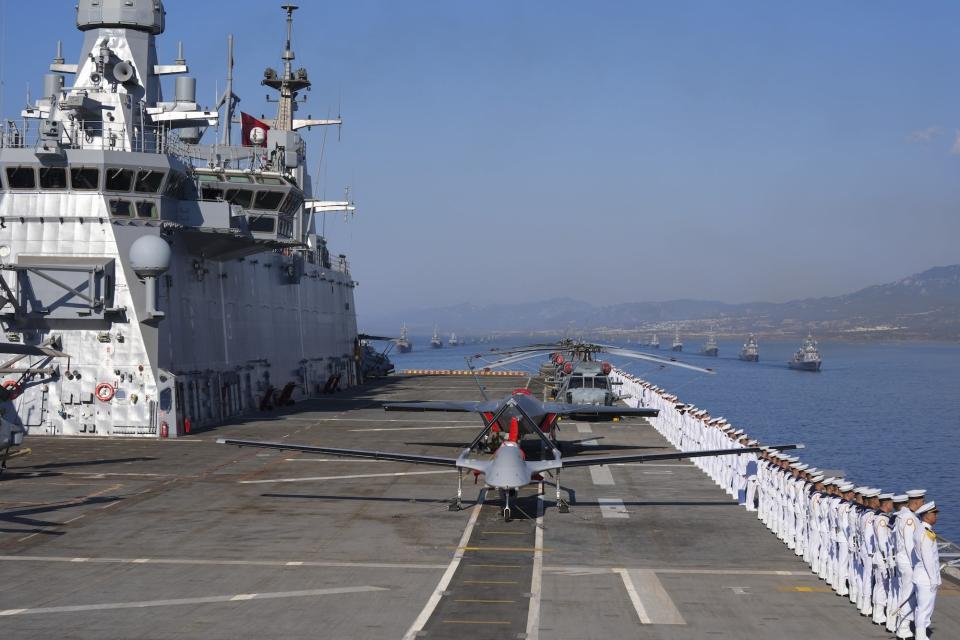 Turkey's TCG Anadolu sailed in a July parade with the Bayraktar TB-3 and Bayraktar KIZILELMA drones on deck.