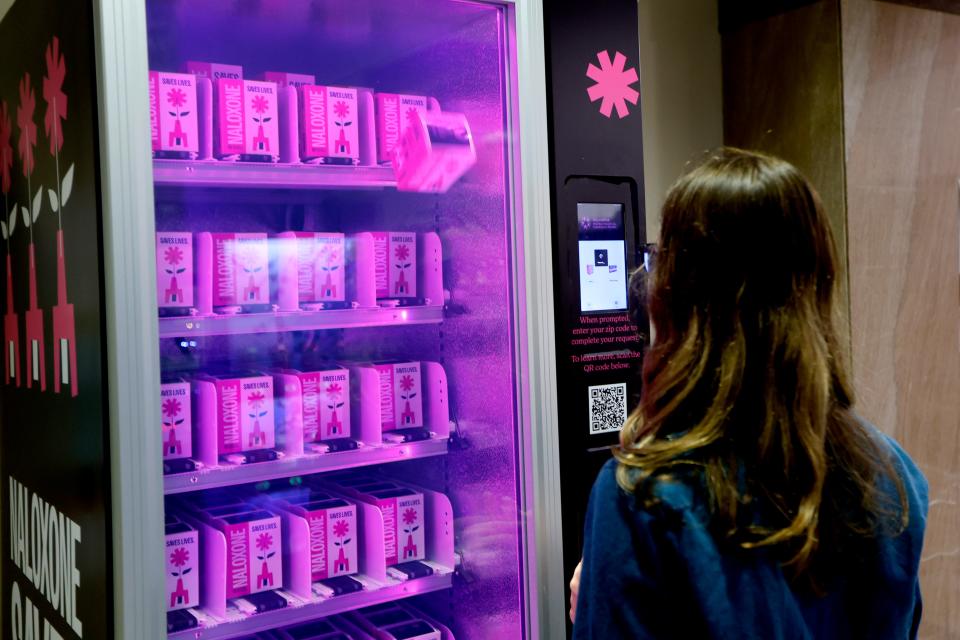 Bryler Duncan uses a Naloxone vending machine inside Oklahoma County's courthouse in Oklahoma City, Thursday, Dec. 14, 2023.