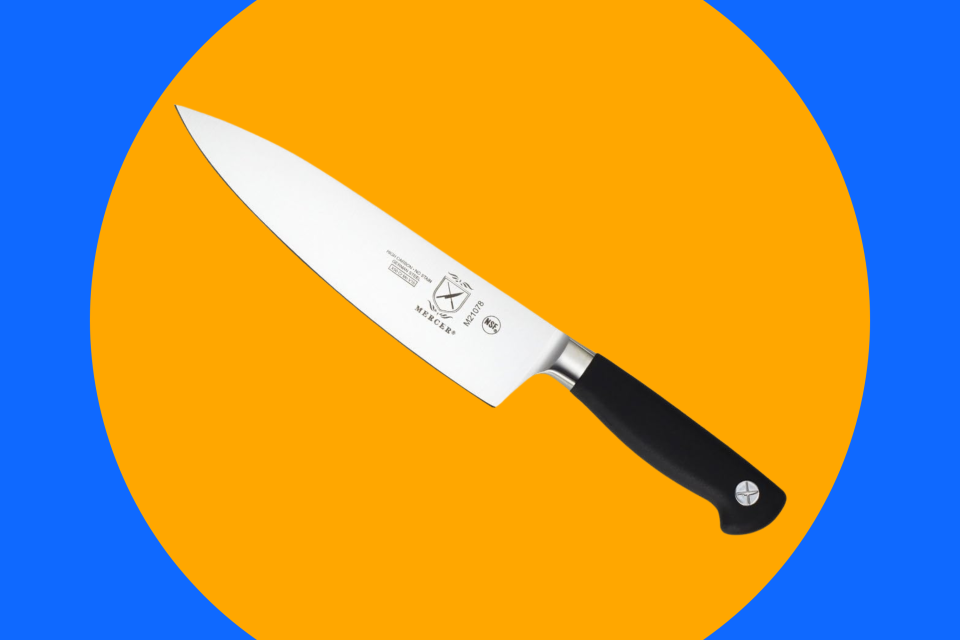 the Mercer chef's knife on a colorful background