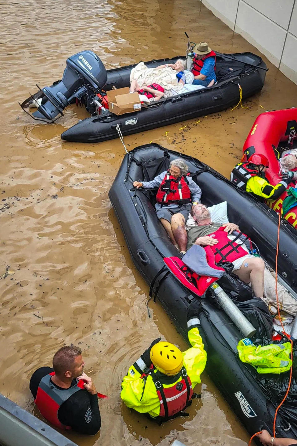 People evacuate Unicoi County Hospital due to unusually high and rising water from the Nolichucky River. (Erwin Police Chief Regan Tilson)